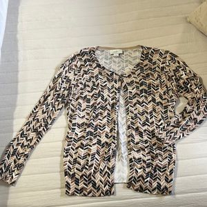 Ann Taylor Loft summer weight cardigan.  Has slight stretch.sleeves are 3/4